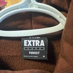 TNA extra fleece perfect hoodie. size medium, chocolate brown. Worn once